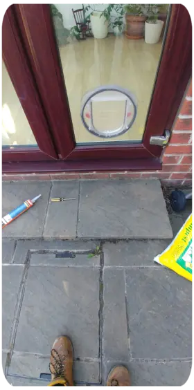 Cat flap. Fitted into glass patio door.